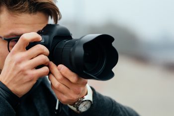 man taking photos