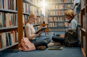 students preparing for exams in the library